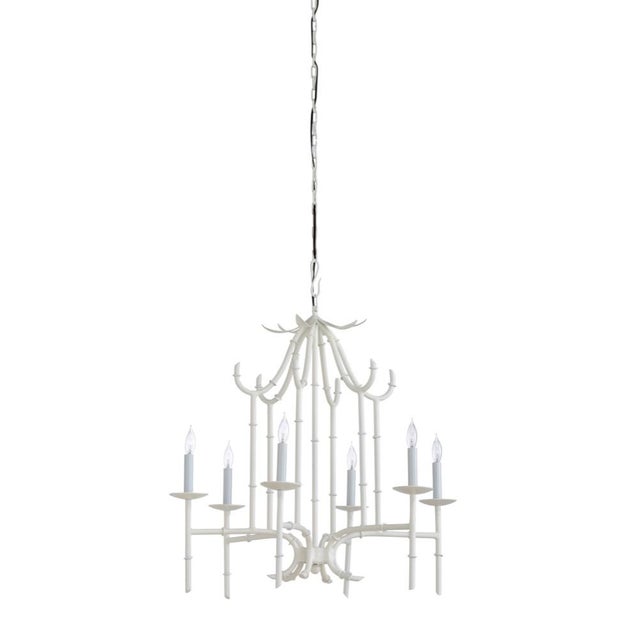 White diamond finish on iron. Comes ready to hang with a 5" canopy and 76" of chain. 28h x 27w x 27d