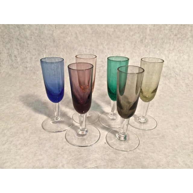 I've been collecting these adorable colored glass aperitif glasses since I was....I won't tell you how old I am now but I...