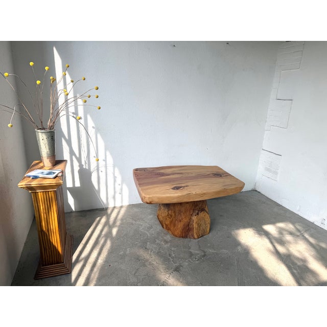 Maison lecan presents this solid cedar coffee table from the 1970s, carved directly from the tree. The slab top, with its...