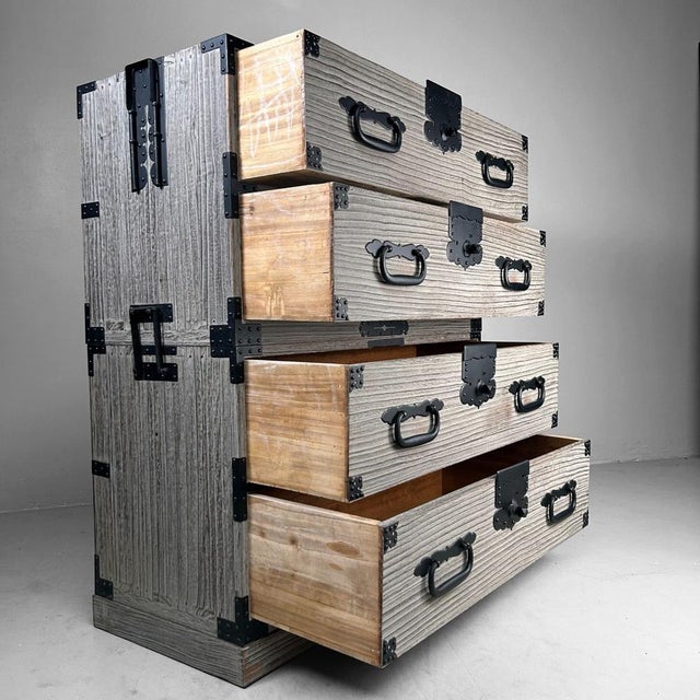 Beautiful Japanese tansu: a two-piece kimono chest (Ishō-dansu) crafted from cedar wood, featuring an attractive and...