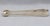 Sterling silver sugar tongs by Samuel Hougham, London, 1802. Neoclassical bright-cut decoration. Period monogram "CST"....