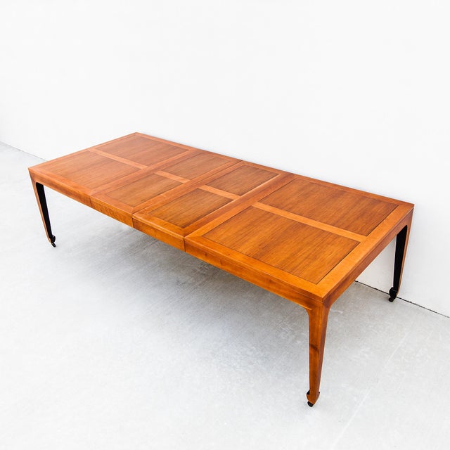 Monumental mid century extension dining table in newly refinished condition, designed by Michael Taylor and produced by...