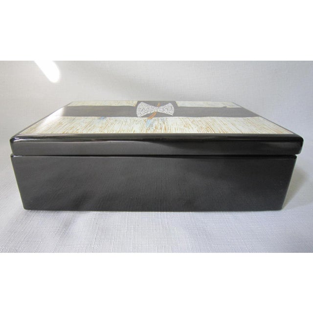Abstract design large Modernist enamel lacquer box. It measres 9 1/2"L x 6.5"W x 3"H and is in excellent condition....