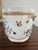 Listing is for a 20th century Porcelaine de Paris cachepot made for Tiffany. The cachepot is painted in a Chinese Export...