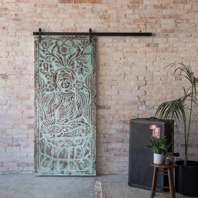 Bring serenity and mindful energy into your space with this Reclaimed Wood Blue Vitarka Buddha Wall Sculpture. Hand-carved...