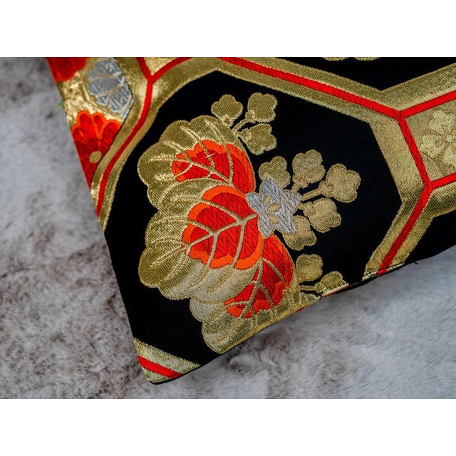 The geometry of a thousand years of longevity. Woven in gold. Once. The Kikkō Royal is a Japanese silk lumbar pillow...
