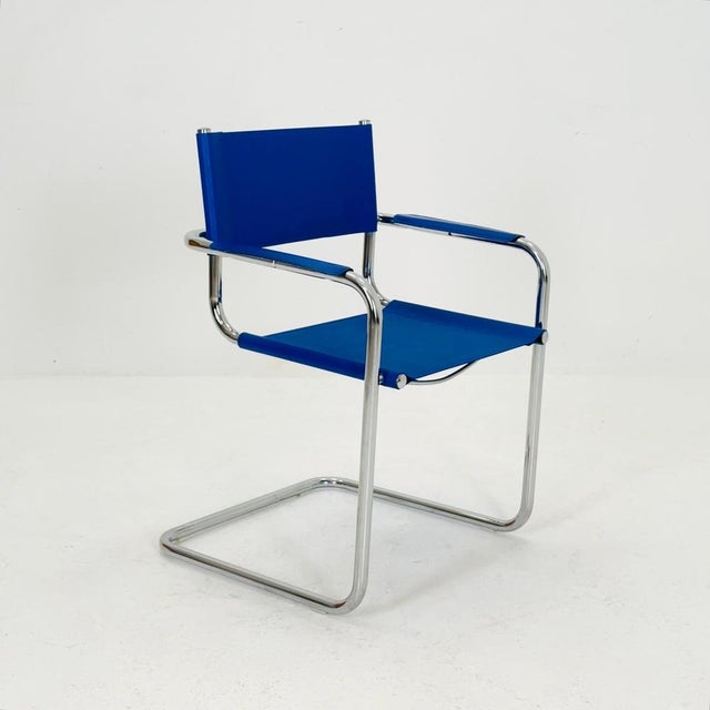 Mid century design s34 armchair in blue and chrome Germany Bring a touch of iconic Bauhaus design into your space with...