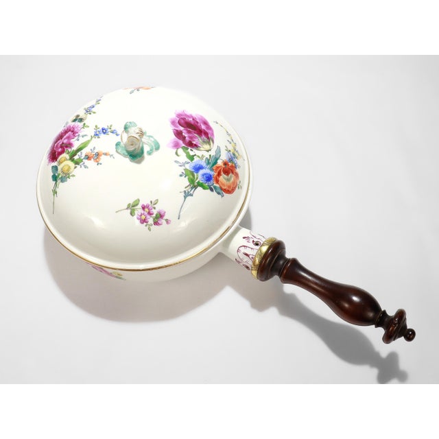 A fine antique German porcelain bordeleau or chamber pot. By Meissen. Dating to the Marcolini period. Decorated throughout...