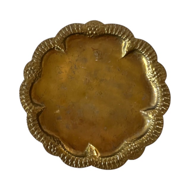 An antique, c. 1920, Arts & Crafts hammered brass tray, by Georg Von Mendelssohn, with textured and scalloped border with...