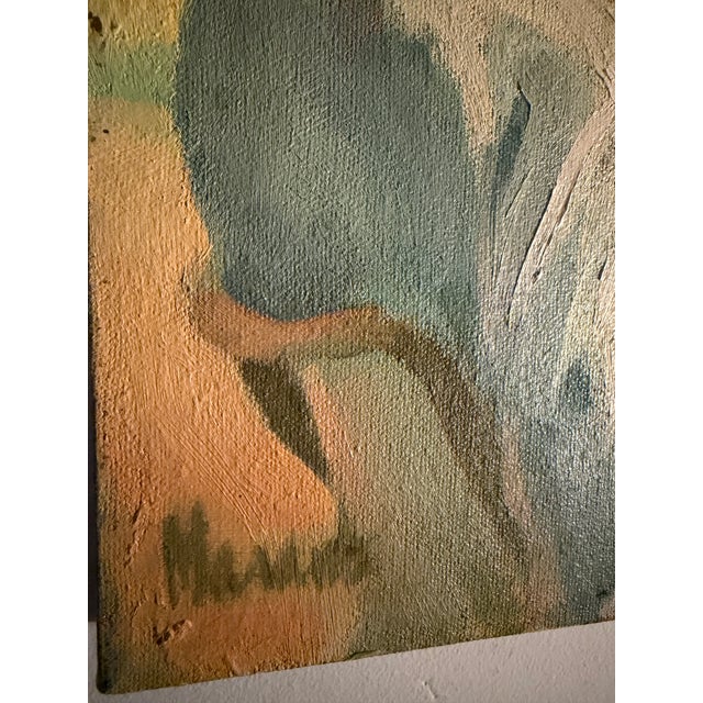 Lovely figurative painting of a beautiful woman sitting on what I imagine to be a beach or seaside cliff at sunset....