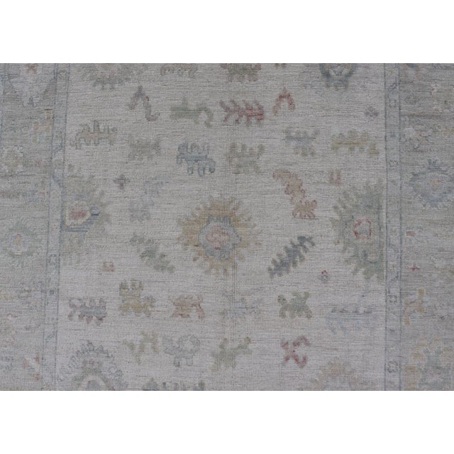 Large Oushak Rug With Floral Motifs & Muted Colorful Tones on Neutral Background For Sale - Image 9 of 12