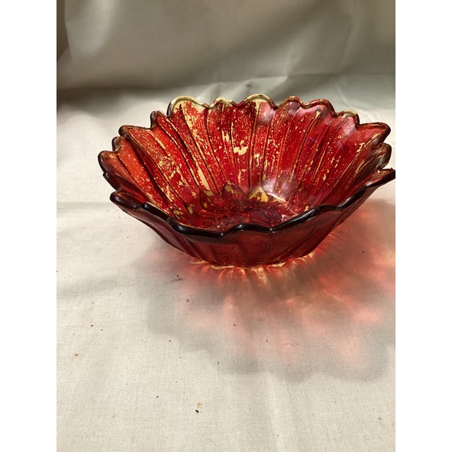 This is a vintage Indiana glass sunflower bowl. It features a sunflower or lily pad shape with a scalloped rim and a...