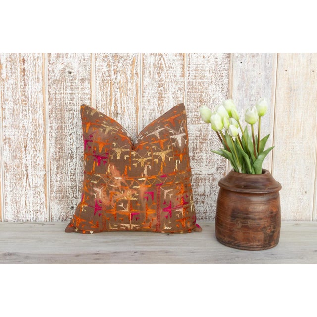 This colorful and luxurious Bagh Phulkari pillow features beautiful hand-done silk embroidery on top of a cotton fabric....