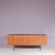 This elegant 1950s teak sideboard, model B20, was designed by Dieter Wäckerling for Behr, Germany. The warm tones and...