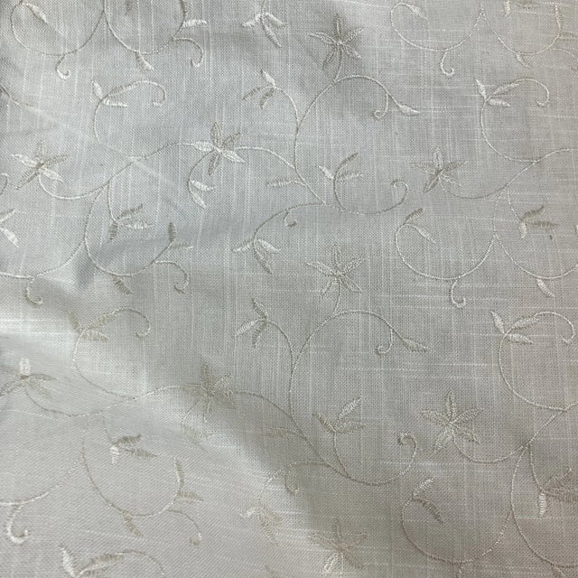 5 yards of beautiful linen fabric with embroidery throughout.