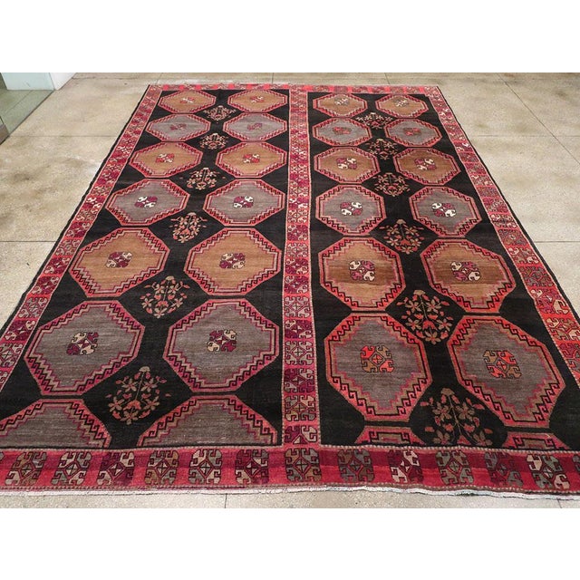 A vintage Turkish Anatolian large room size carpet handmade during the Mid-20th century. Measures: 11' 4" x 16' 1"