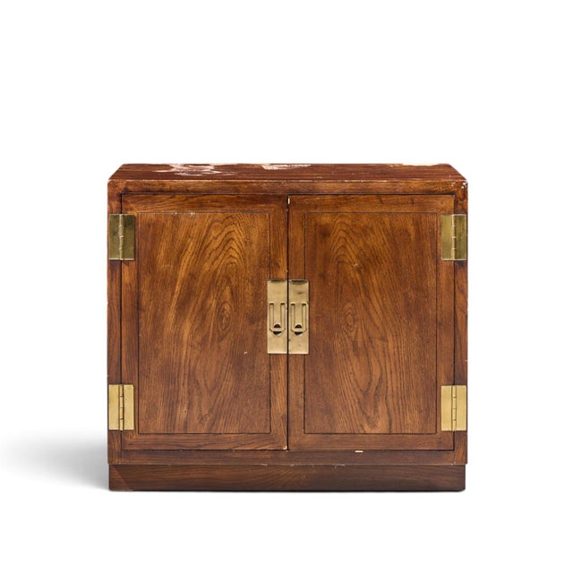 Henredon Campaign Mid Century Walnut and Brass Cabinet This cabinet measures: 32 wide x 18 deep x 28 inches high Fair...