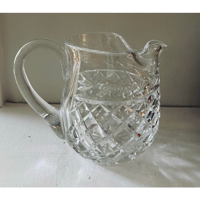 Excellent condition. 6" tall, 8" wide. Very sparkly. The Waterford Crystal Pitcher, Glandore made in Ireland in 1985, is a...