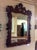 Item: Vintage Carved Wood Frame Mirror. Age & Condition: Circa 1990. Good, refinished, new wire hanger. Dimensions: 37.5″...