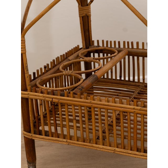 Bamboo cart, Made in Italy, 1960s. Beautiful two-tiered bamboo and rattan cart made in the 1960s. It has metal wheels. It...