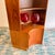 Striking mid-century modern corner cabinet by G Plan, crafted in warm-toned teak and designed to maximize both form and...