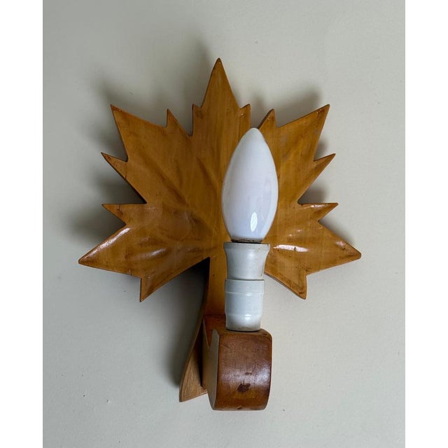 This exceptional wall lamp from Sweden is a unique design piece dating back to the 1950s, distinguished by its organic...