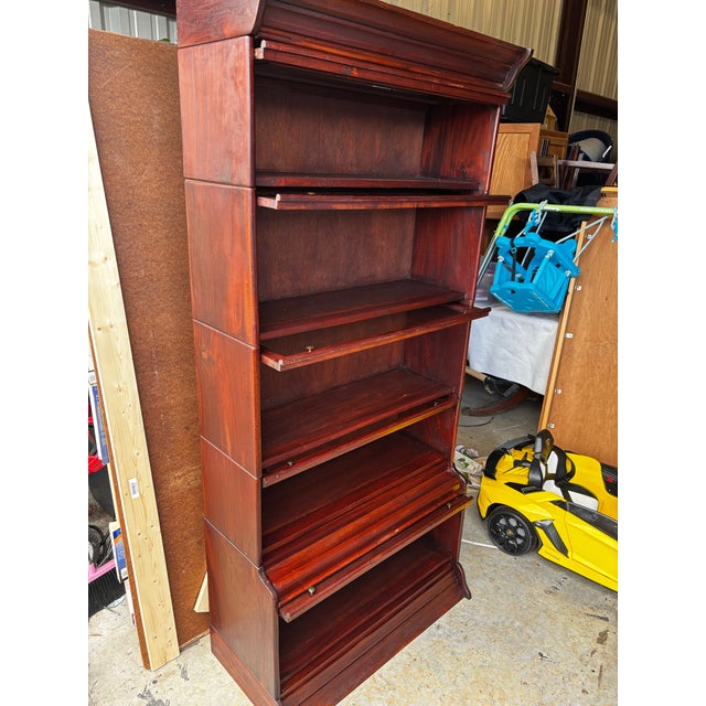 Handmade antique barrister bookcase 5 bookcases, 7 pieces in total. All pieces come apart. It’s is over 6ft tall. I do not...