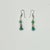 A lovely pair of Dangle Earrings. Each earring features a Jade Bead, a Turquoise Rock and Sterling Silver Beads and...