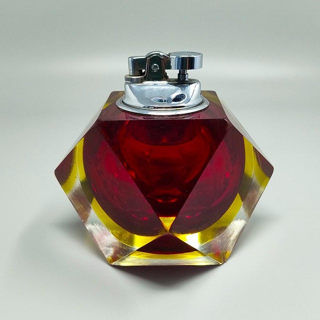 1960 Stunning table lighter in Murano sommerso glass by Flavio Poli for Seguso. Made in italy. The item is in excellent...