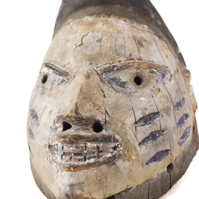 The Gelede mask, originating from the Yoruba people living along the southwestern Nigerian and Beninese border, showcases...