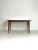 Danish Extendable Teak Dining Table – 1960s An elegant Danish teak dining table dating from the 1960s , characterised by...