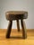 A magnificent and sculptural tripod stool, modernist, brutalist, popular art, solid wood carved with gouge, to be...
