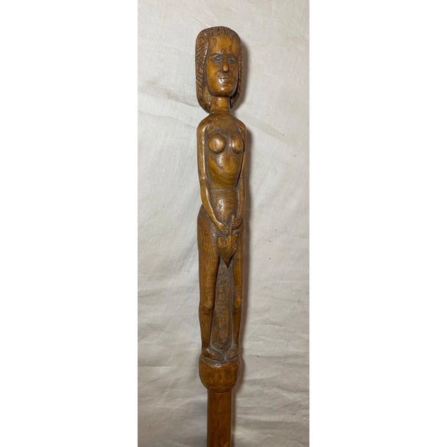 This vintage French World War Two era POW walking stick is a unique piece that dates back to the 1940s. It features a...