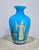 This striking antique Bohemian vase features vibrant sky blue cased glass with an opaline white interior. The surface is...