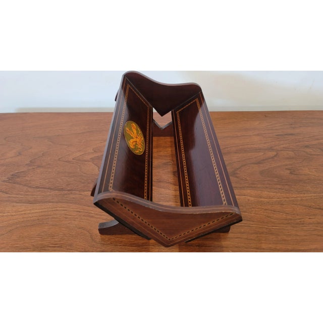 A wonderful Book holder made at Lord Roberts Memorial Workshop. Prince of Wales with Feather Inlay. Mahogany wood. Made in...