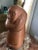 Mid-Century modern abstract statue of a woman. Finely sculpted figure of a woman with her arms wrapped around herself in a...