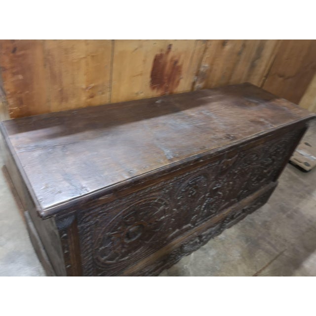 Unique piece. Magnificent late Gothic walnut chest, made with a single walnut board for each side, as was customary at the...
