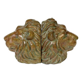 Pair of Regal Bronze Lion Head Bookends with Verdigris Patinated Highlights For Sale