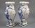 The vases form an original matched pair, with identical moulded baluster bodies, four-lobed rims and bases, prominent...