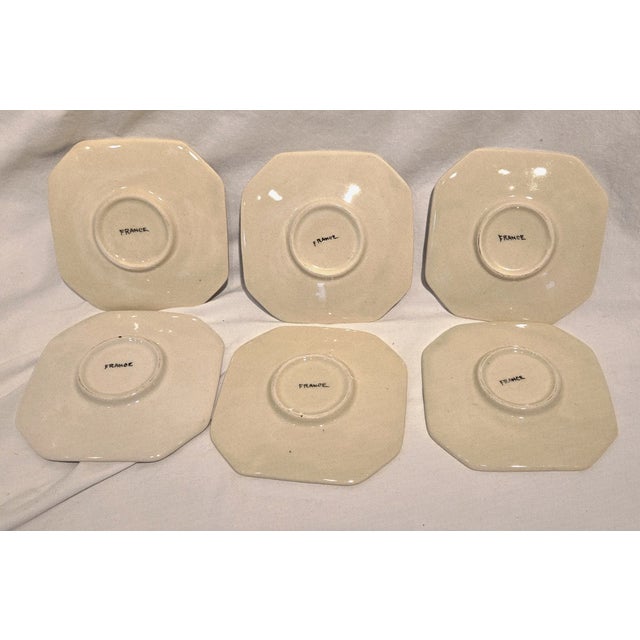 Bring a touch of classic French charm to your table with these vintage HB Quimper Faience Mistral platters, beautifully...