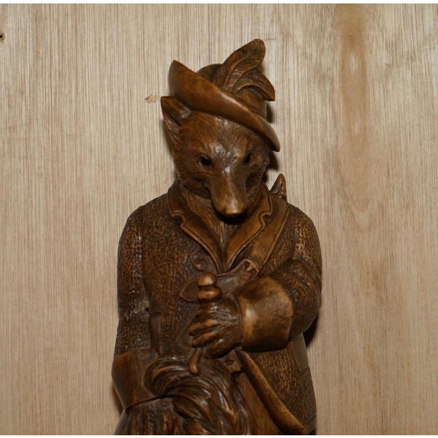 We are delighted to offer for sale this exceptionally rare, Musical, original circa 1880 Swiss made Black Forest wood, Fox...