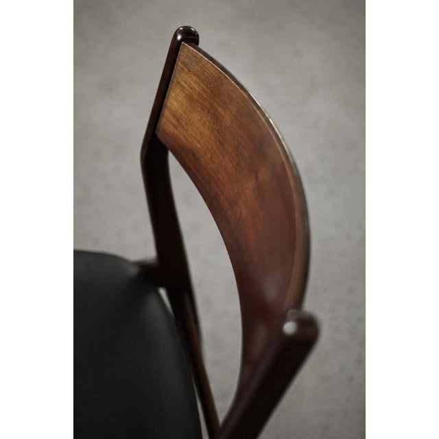 This set of four vintage chairs was made in Denmark during the 1960s. The elegant frame is made of beech wood in a...