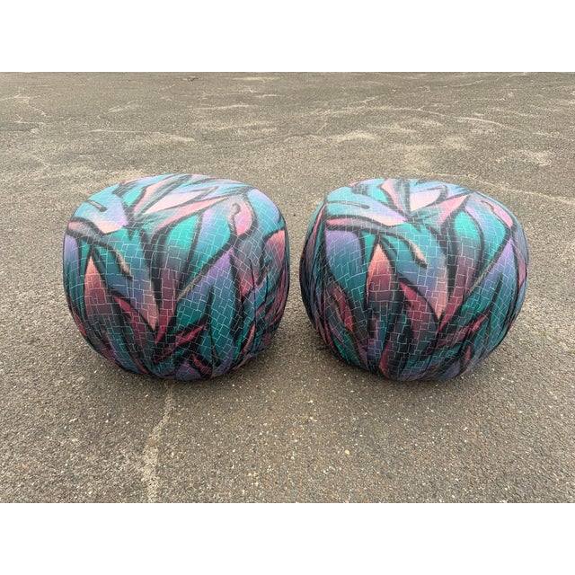 Original Pair of 1980s poofs by Weiman Furniture. An original upholstered, graffiti style with vibrant colors. They are...