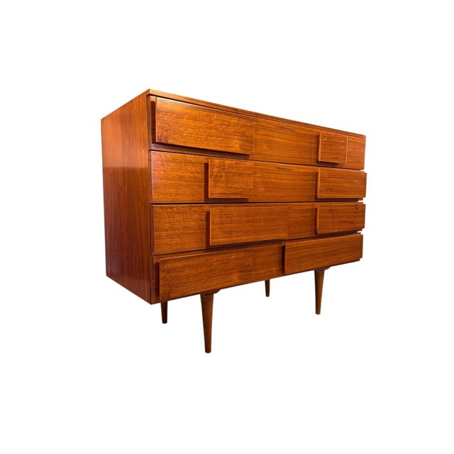 Sleek and sophisticated, this mid-century Italian modern walnut dresser features a striking architectural design. Clean...