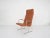 Very rare lounge chair designed by Dieter Rams for Vitsoe. The chair has been reupholstered in cognac faux-leather. The...