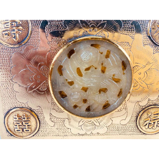 This is a solid brass ornately decorated Chinese made trinket box. This trinket box has four medallions on each corner of...
