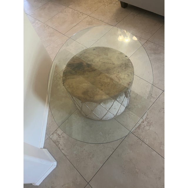 This wonderful Drum Accent Table brings the rhythm of the desert into your living space. The table features a cut glass...