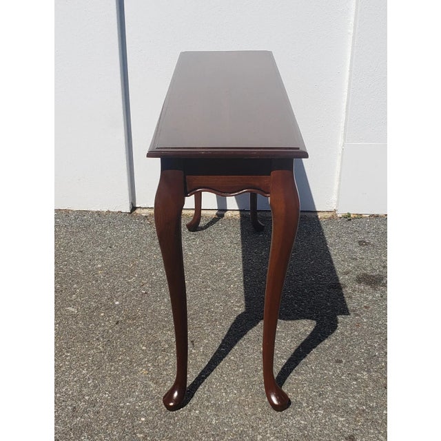 Mahogany Queen Anne style console table; (light scratches on top)