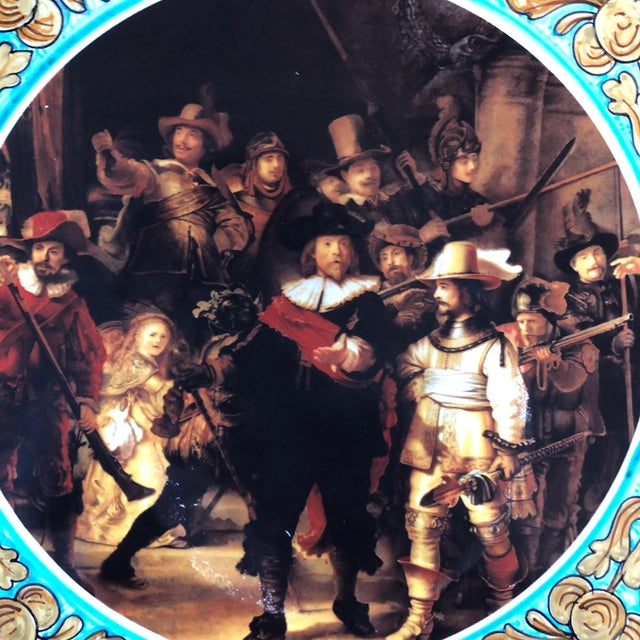 Italian majolica wall charger with an image of Rembrandt's "The Night Watch".