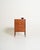 Teak frame with four drawers, light ash side panels, recessed handles, and dovetail joints. Gillis Lundgren, 1960s. A...